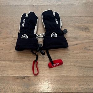 Hestra Black and White Mittens with Red Strap